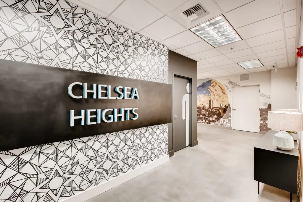 Lobby with restrooms at Chelsea Heights apartments in Pierce County, WA