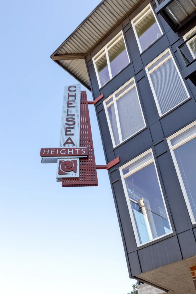 Building sign that says Chelsea Heights